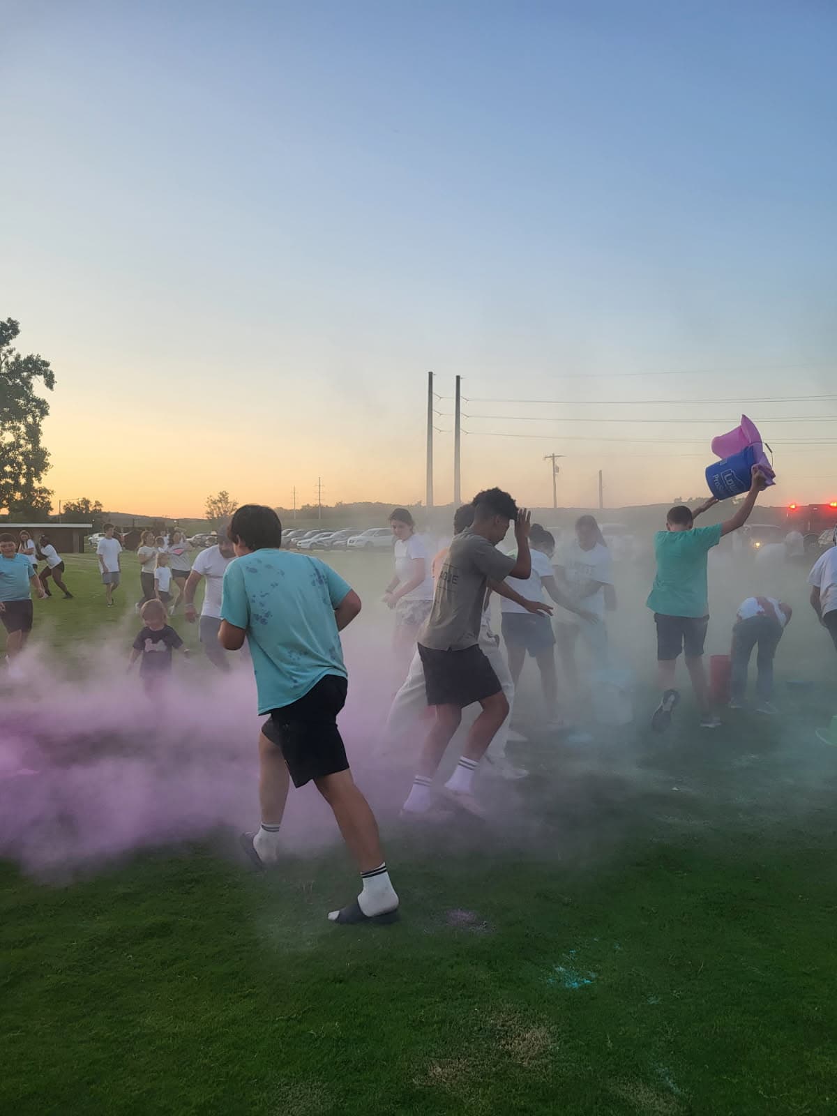 Youth group color run at sunset